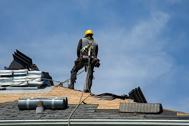 Professional Roofing technician working in Colchester, VT